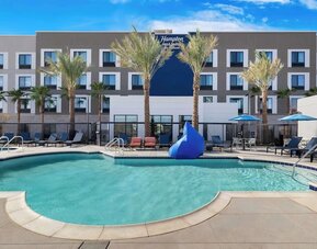 Outdoor pool at Hampton Inn & Suites Corona, CA.