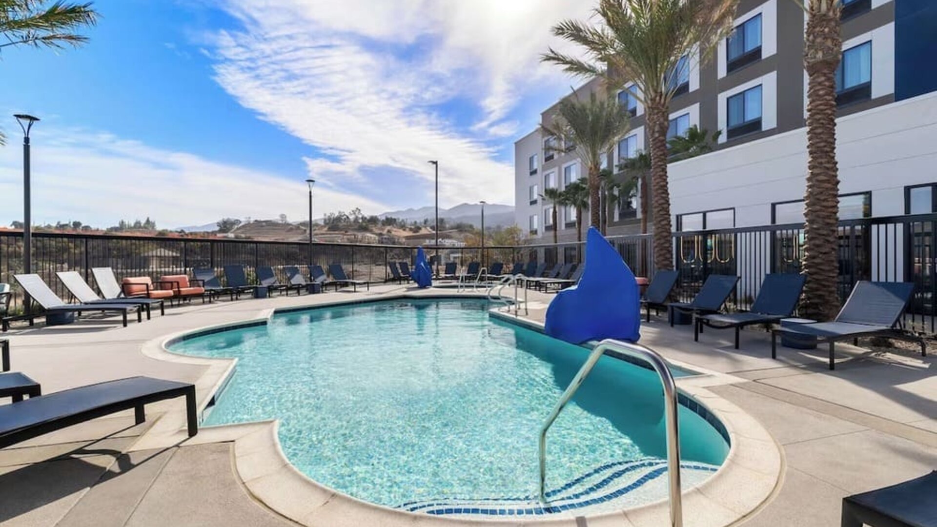 Outdoor pool area at Hampton Inn & Suites Corona, CA.