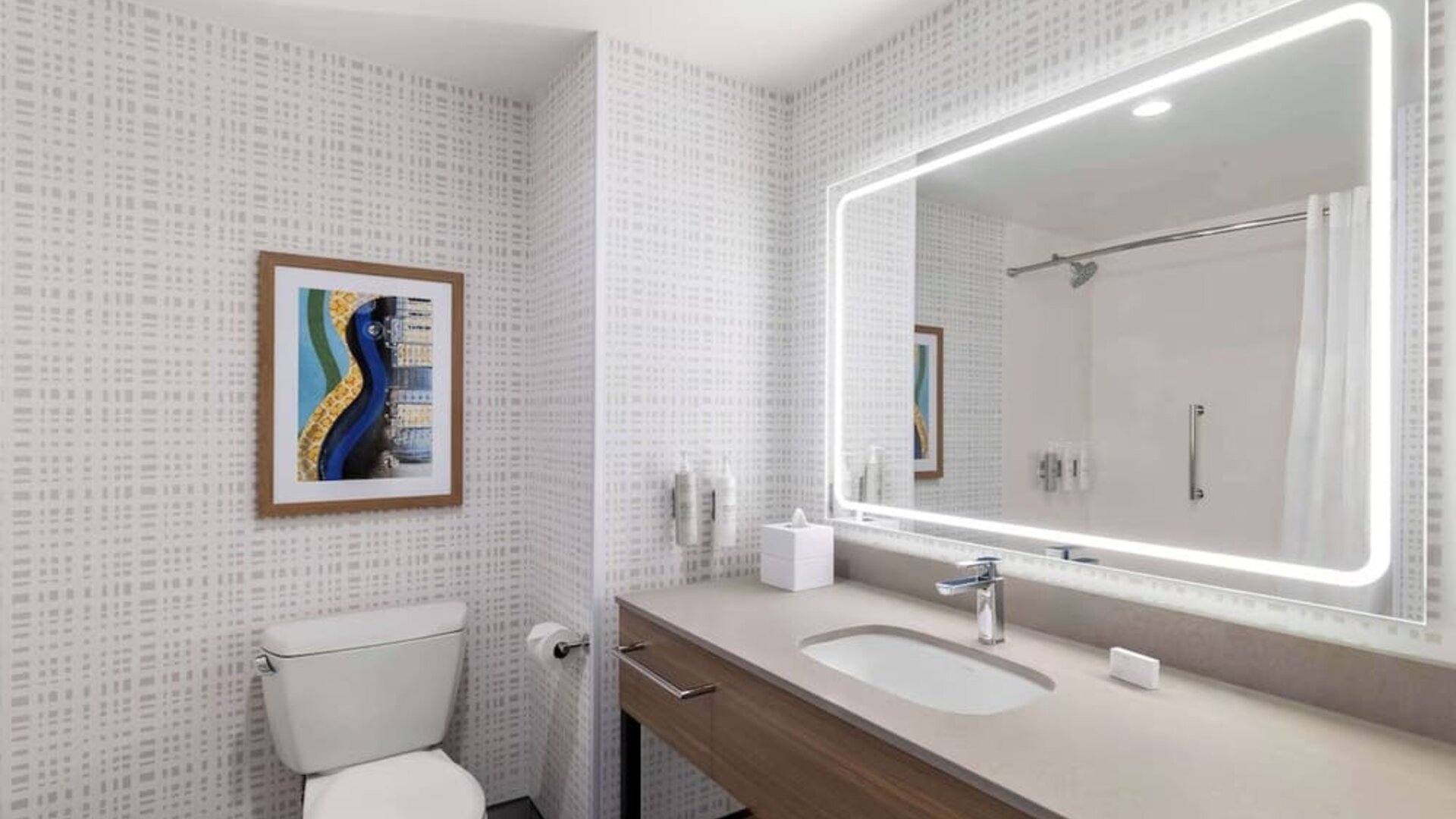 Guest bathroom at Hampton Inn & Suites Corona, CA.