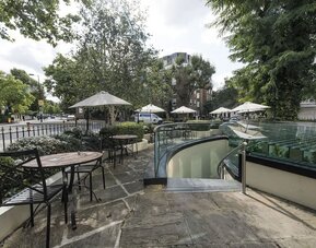 Outdoor seating at The Colonnade Hotel.