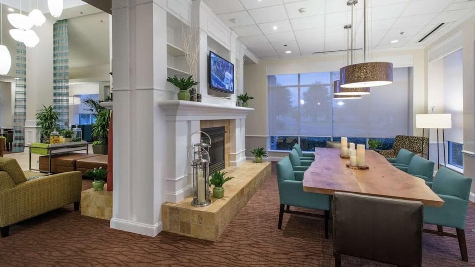 Lobby and coworking lounge at Hilton Garden Inn Macon / Mercer University.
