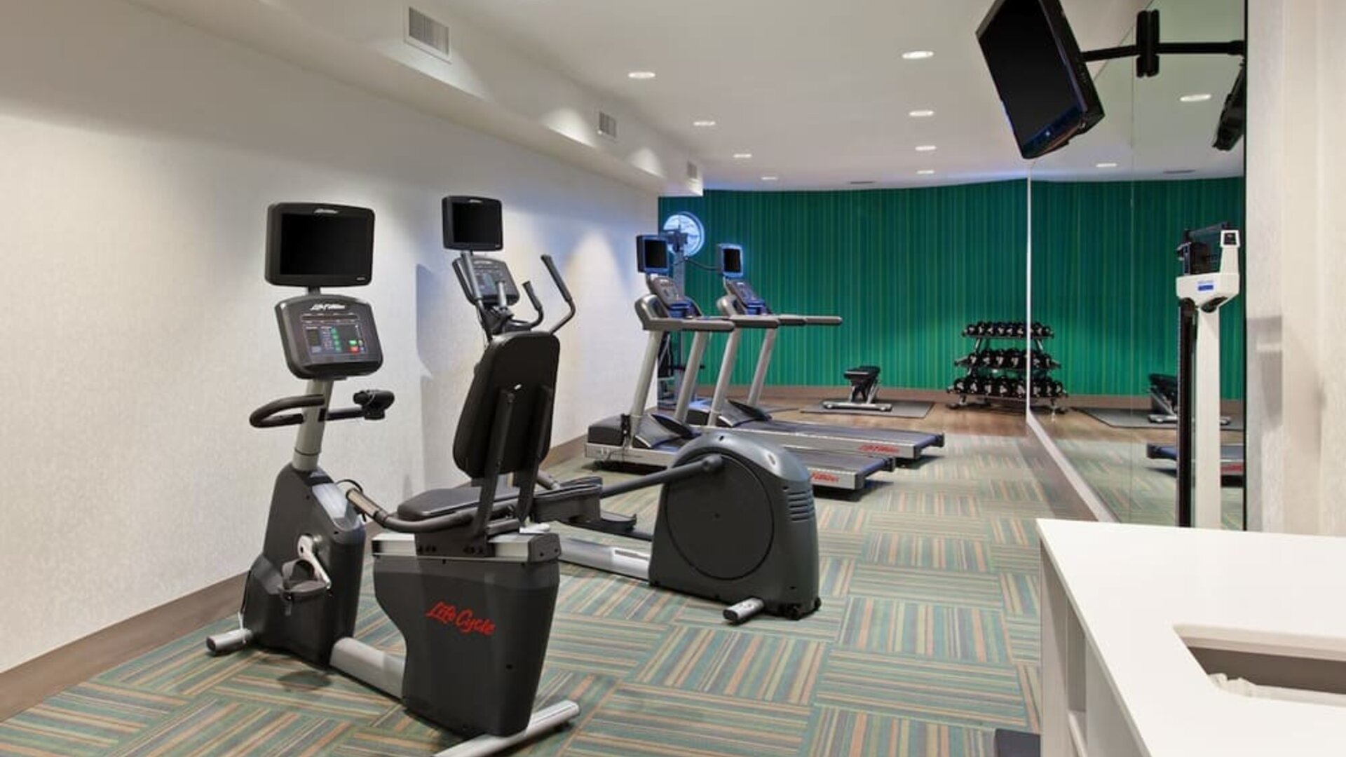 Fitness center available at Holiday Inn Express & Suites Corona.