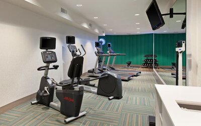 Fitness center available at Holiday Inn Express & Suites Corona.