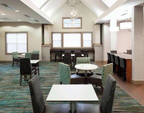 Dining area perfect for coworking at Residence Inn By Marriott Hattiesburg.