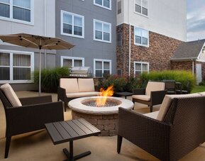 Firepit and outdoor furniture at Residence Inn By Marriott Bentonville Rogers.