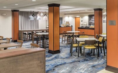 Dining area perfect for coworking at Fairfield Inn & Suites Kansas City Overland Park.