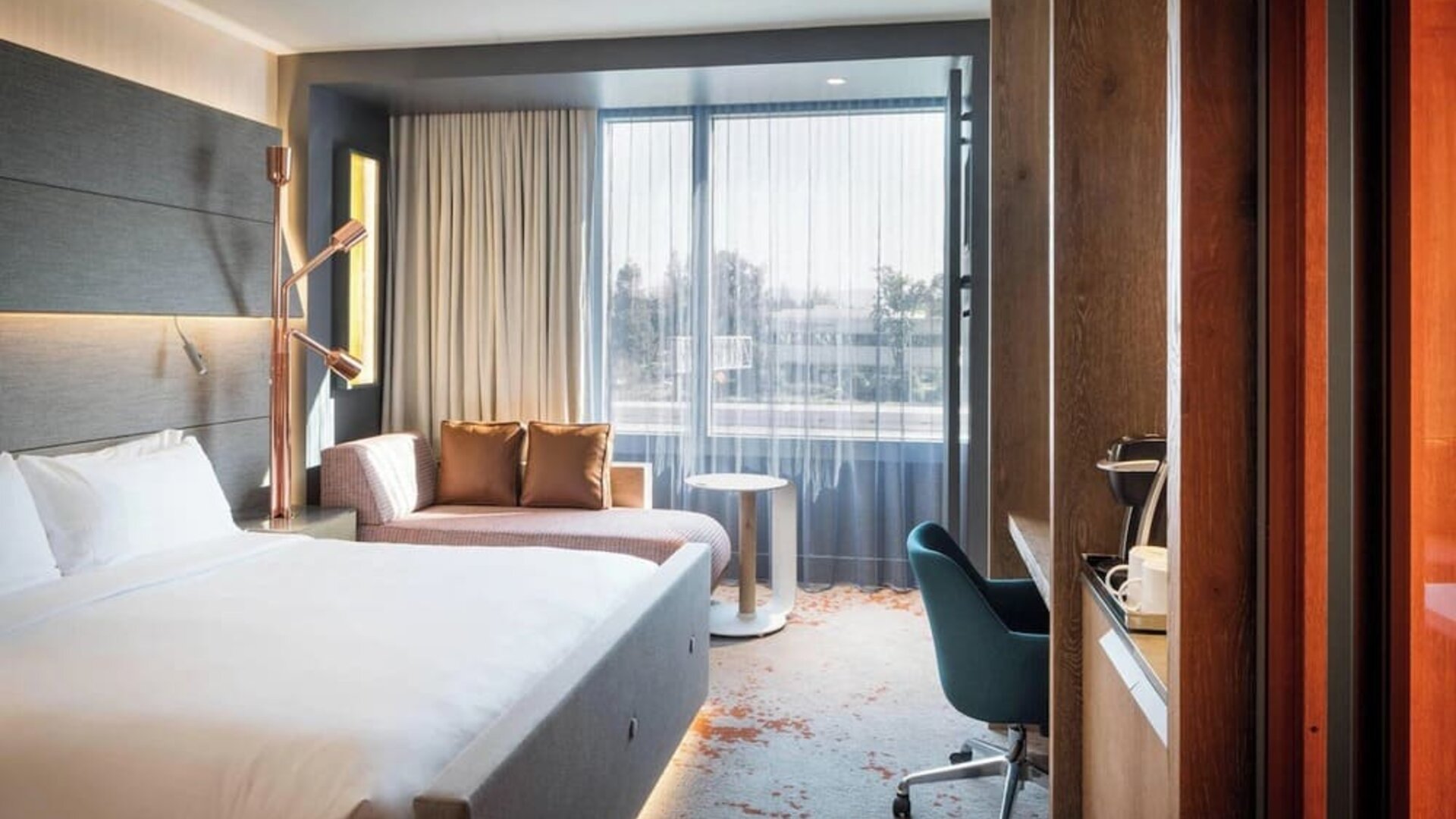 Day use room with work desk and sofa at Hotel Nia, Autograph Collection.