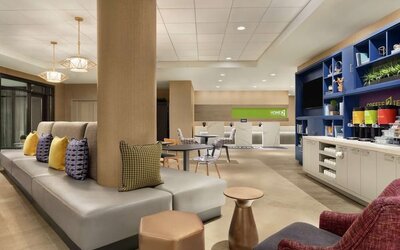 Lobby and coworking lounge at Home2 Suites By Hilton Chicago River North.
