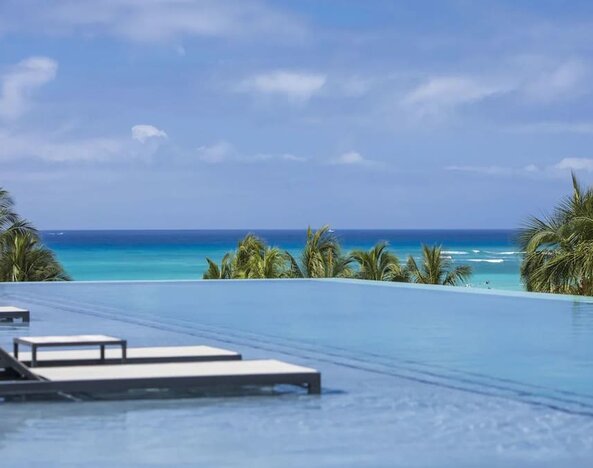 Refreshing infinity pool at Alohilani Resort Waikiki Beach.
