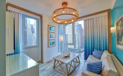 Day use room with lounge area at Margaritaville Resort Times Square.