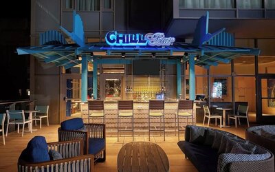 Hotel bar at night at Margaritaville Resort Times Square.