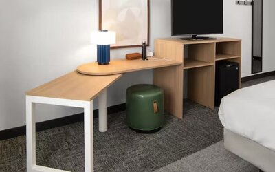 Hotel room with work space at Spark By Hilton Houston Hobby Airport.