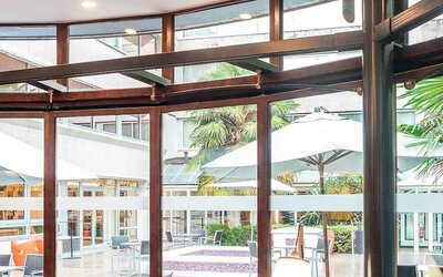 Outdoor terrace seating at DoubleTree By Hilton Paris Bougival.