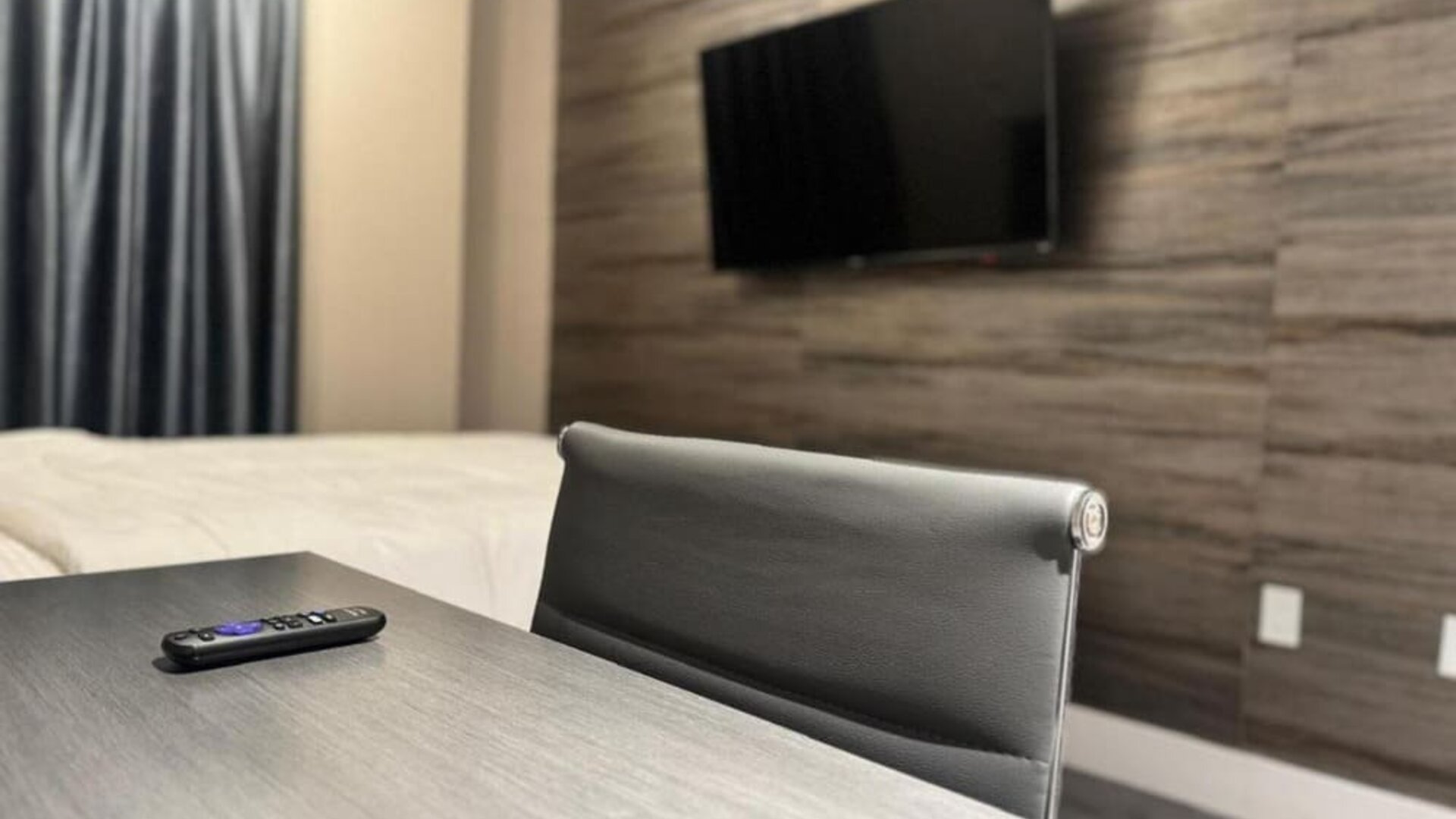 Day use room's include workdesk, private bathroom  and TV screen at Rose Hotel, Bronx.