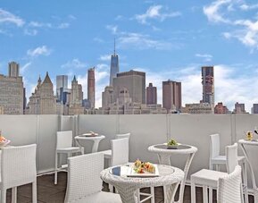 Rooftop dining at Wyndham Garden Chinatown NYC.