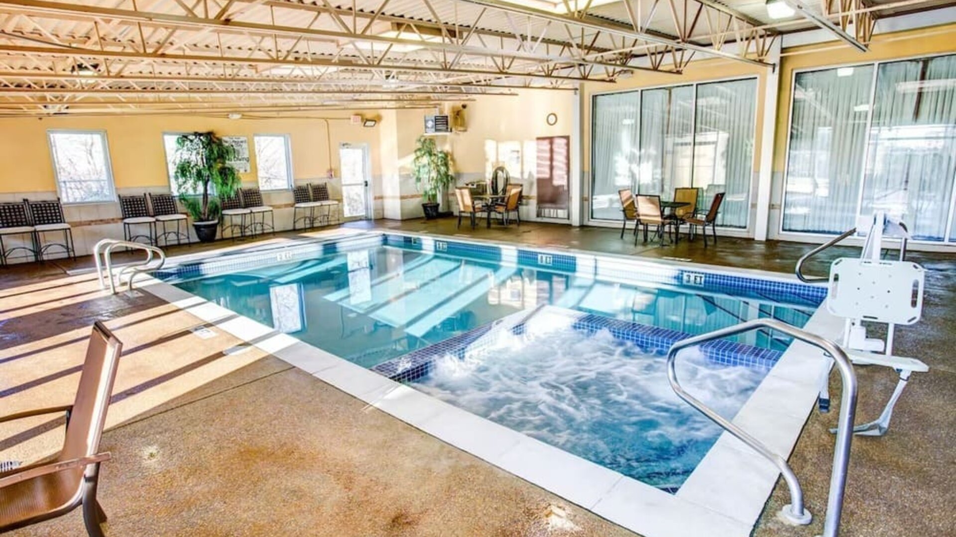 Refreshing indoor pool at Comfort Inn & Suites Triadelphia.
