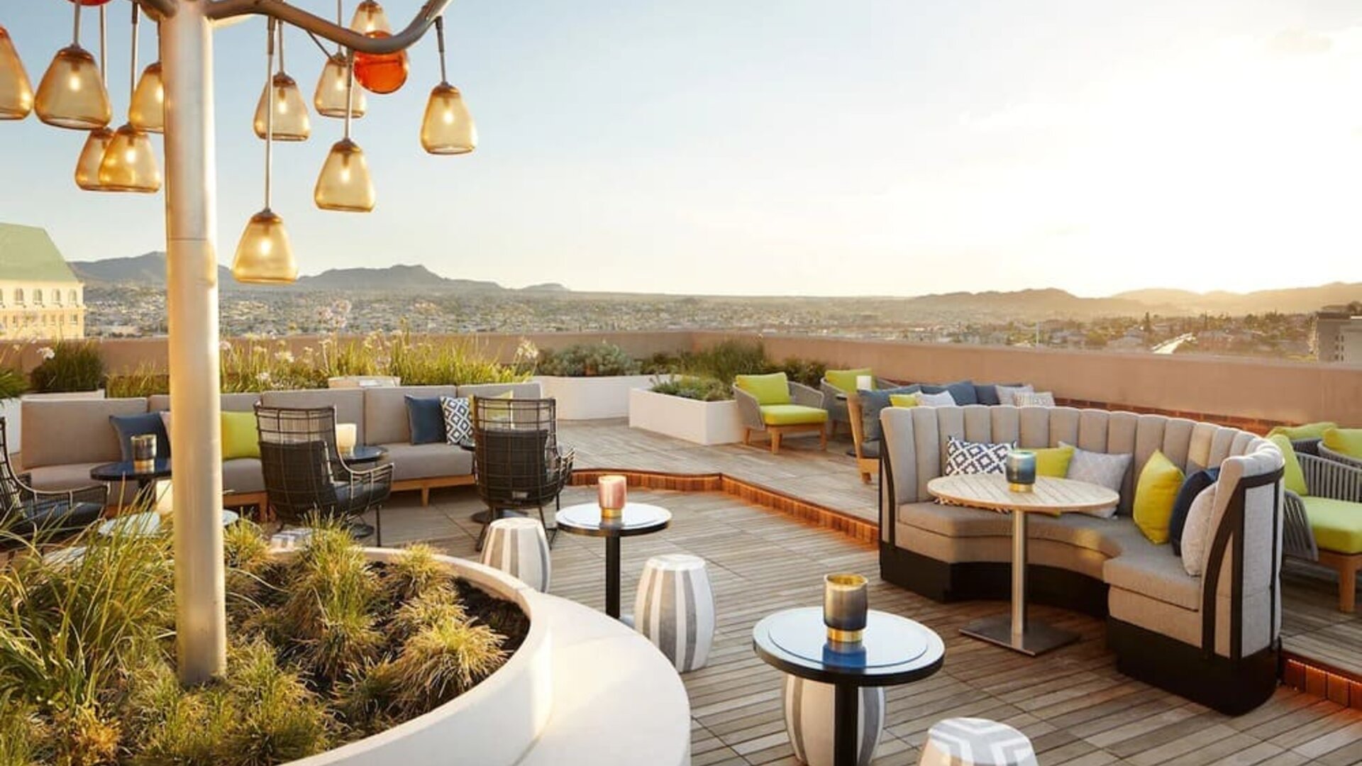 Outdoor furniture in rooftop perfect for coworking at The Plaza Pioneer Park, El Paso.