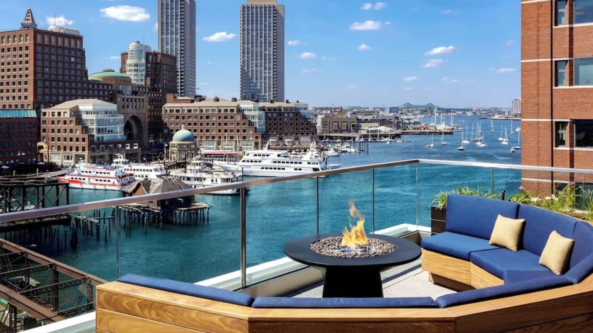 Rooftop furniture with fire pit at The Envoy Hotel, Autograph Collection.