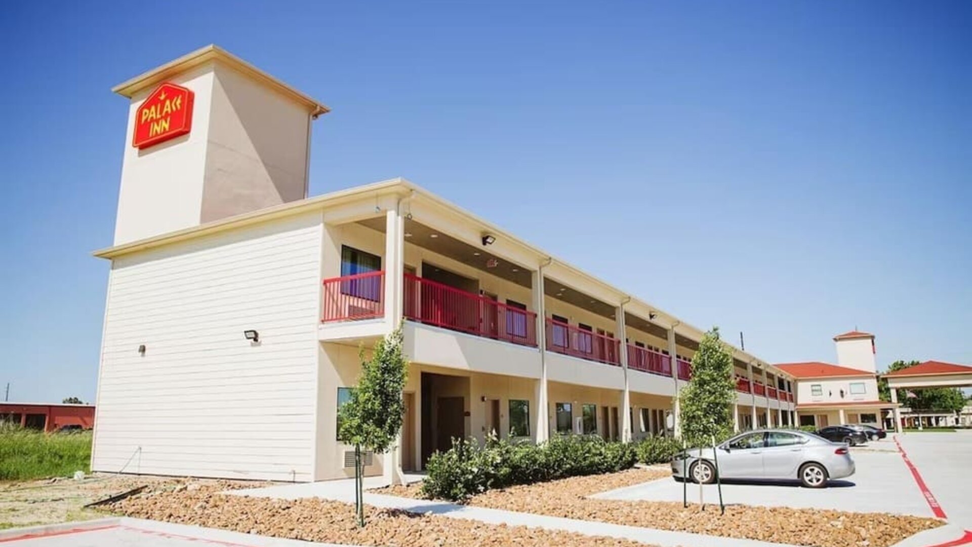 Hotel parking at Palace Inn 290 & Jones Rd.