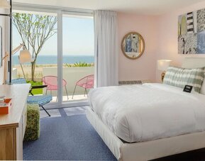 Day use room with a view of the ocean at Plunge Beach Resort.