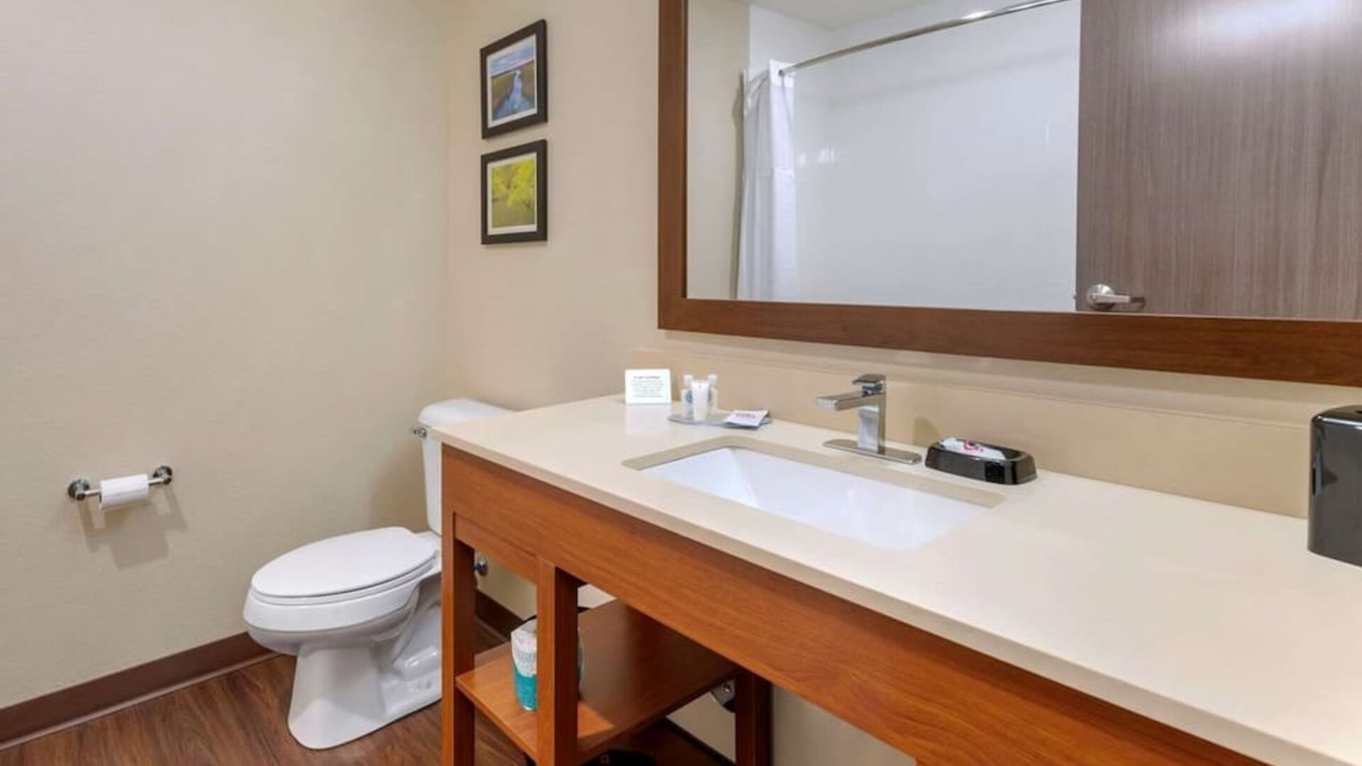 Guest bathroom with shower at Comfort Inn & Suites Mankato.