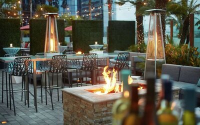 Outdoor patio at Embassy Suites By Hilton San Diego-La Jolla.