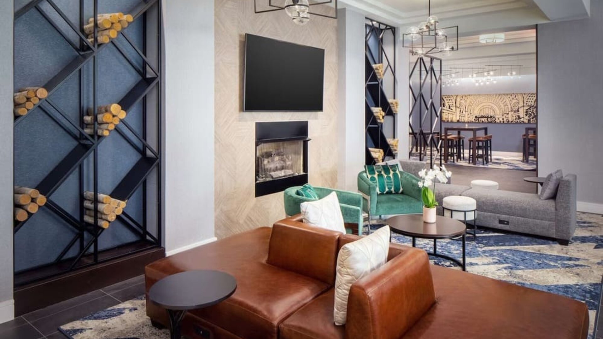 Lobby lounge with comfortable seating at Hilton Garden Inn Washington DC Downtown. 