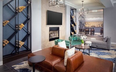 Lobby lounge with comfortable seating at Hilton Garden Inn Washington DC Downtown. 