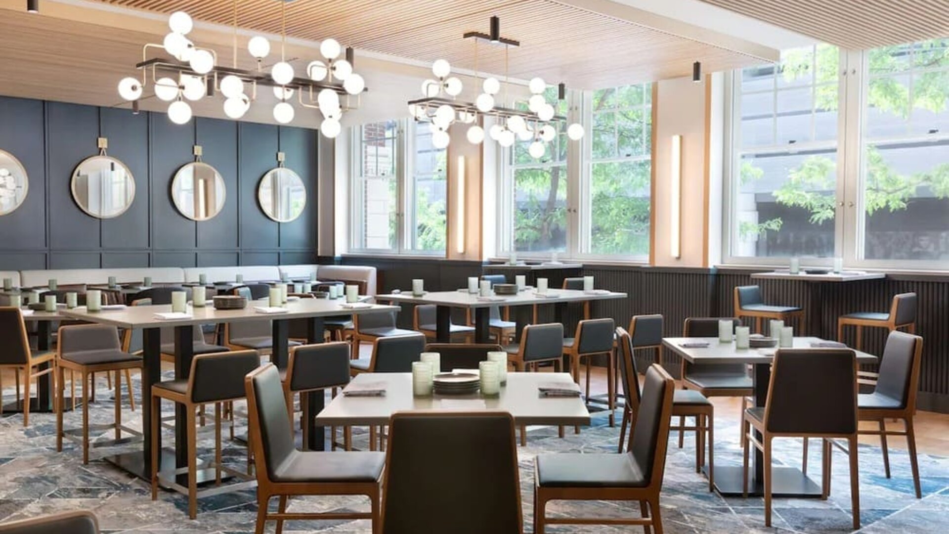 Dining area perfect for coworking at The Slate Denver, Tapestry Collection By Hilton.