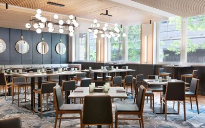 Dining area perfect for coworking at The Slate Denver, Tapestry Collection By Hilton.