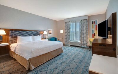 Spacious day use room with work desk at Hampton Inn & Suites Sunnyvale Silicon Valley.