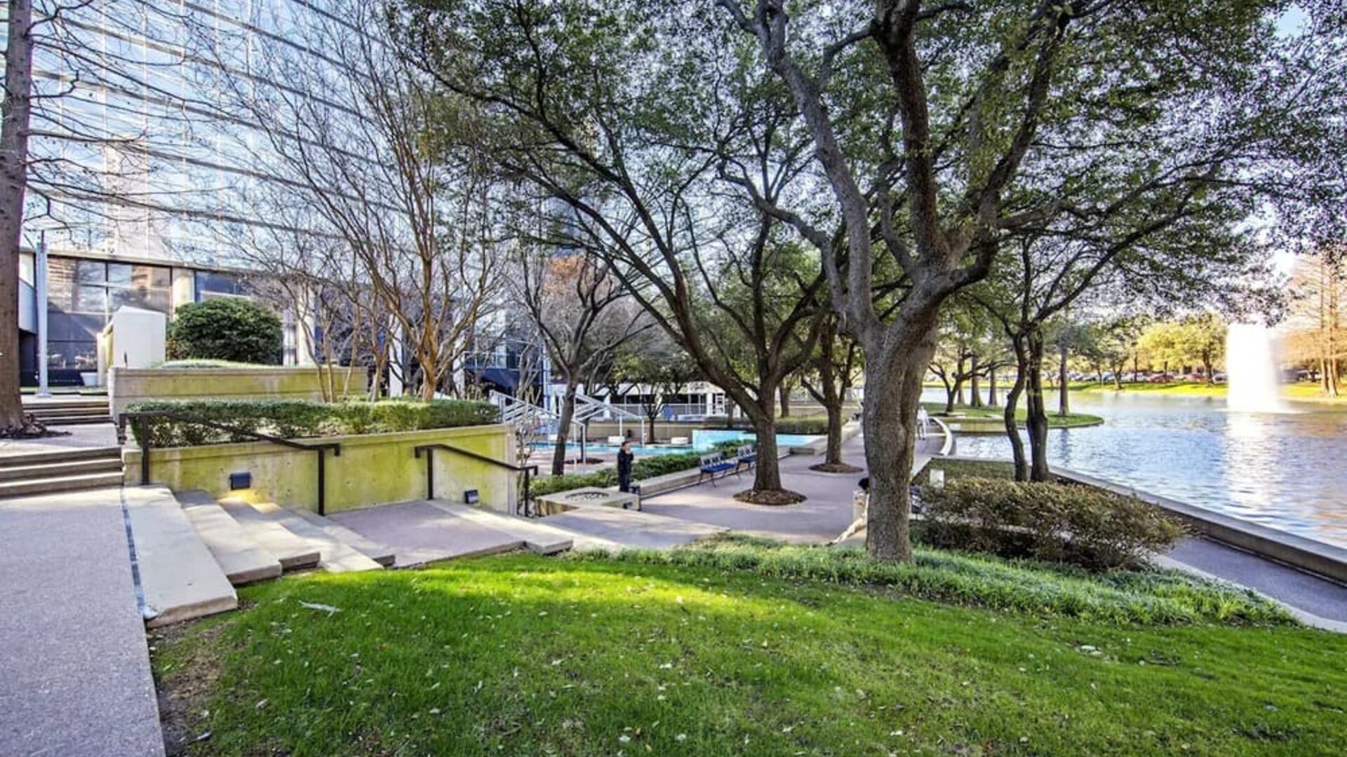 Courtyard beside private lake at Hilton Dallas Lincoln Centre.