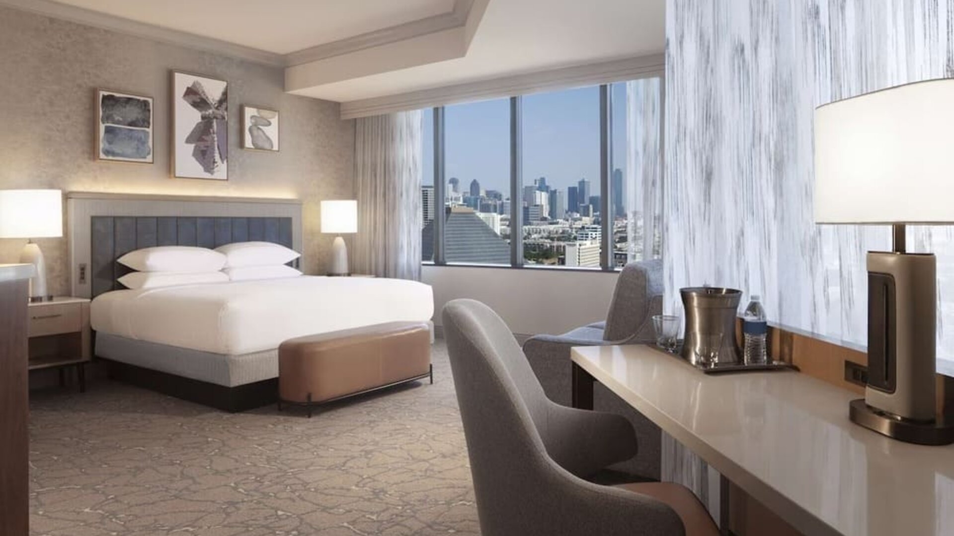 Day use room with work desk and sofa at Hilton Anatole.
