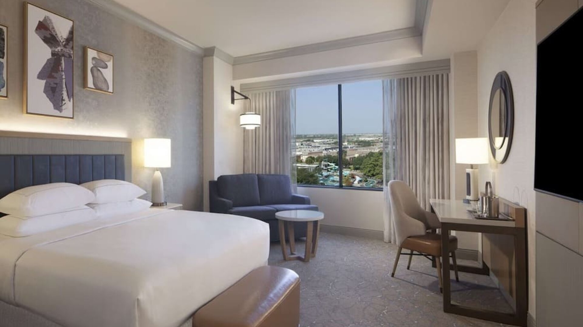 Day use room with work desk and sofa at Hilton Anatole.