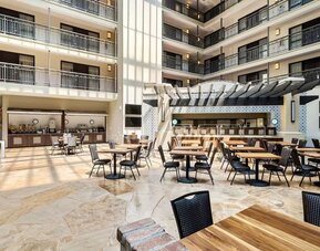 Dining area perfect for coworking at Embassy Suites By Hilton Los Angeles International Airport South.
