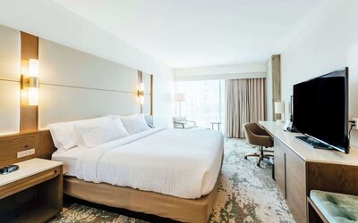 Day use room with work desk and natural light at Hilton Garden Inn Denver Union Station.
