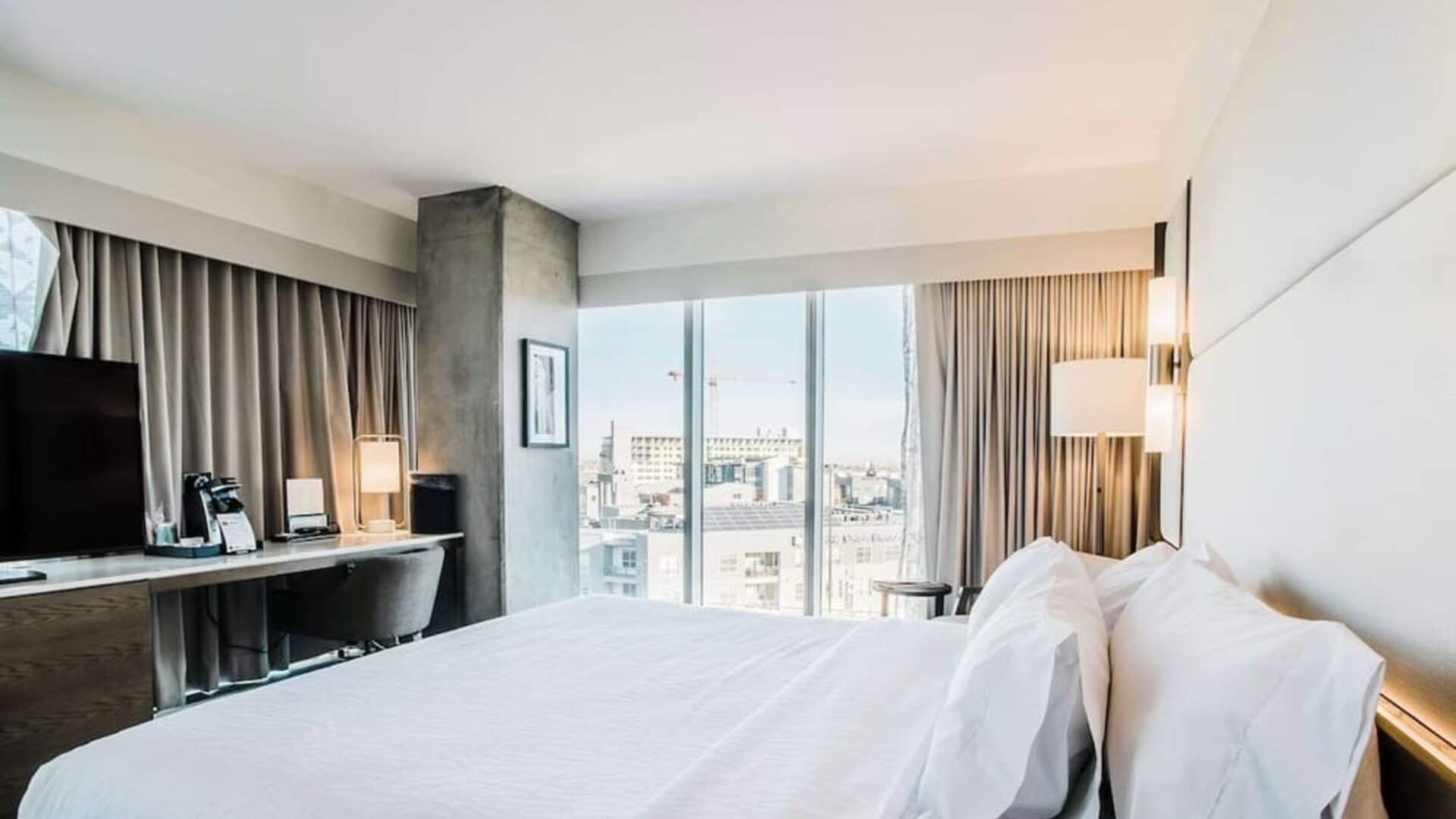 Day use room with work desk and natural light at Hilton Garden Inn Denver Union Station.
