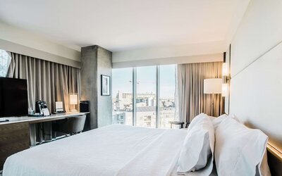 Day use room with work desk and natural light at Hilton Garden Inn Denver Union Station.