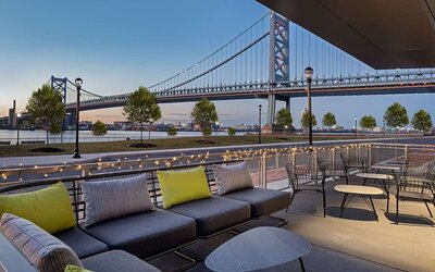 Outdoor furniture perfect for coworking at Hilton Garden Inn Camden Waterfront Philadelphia.