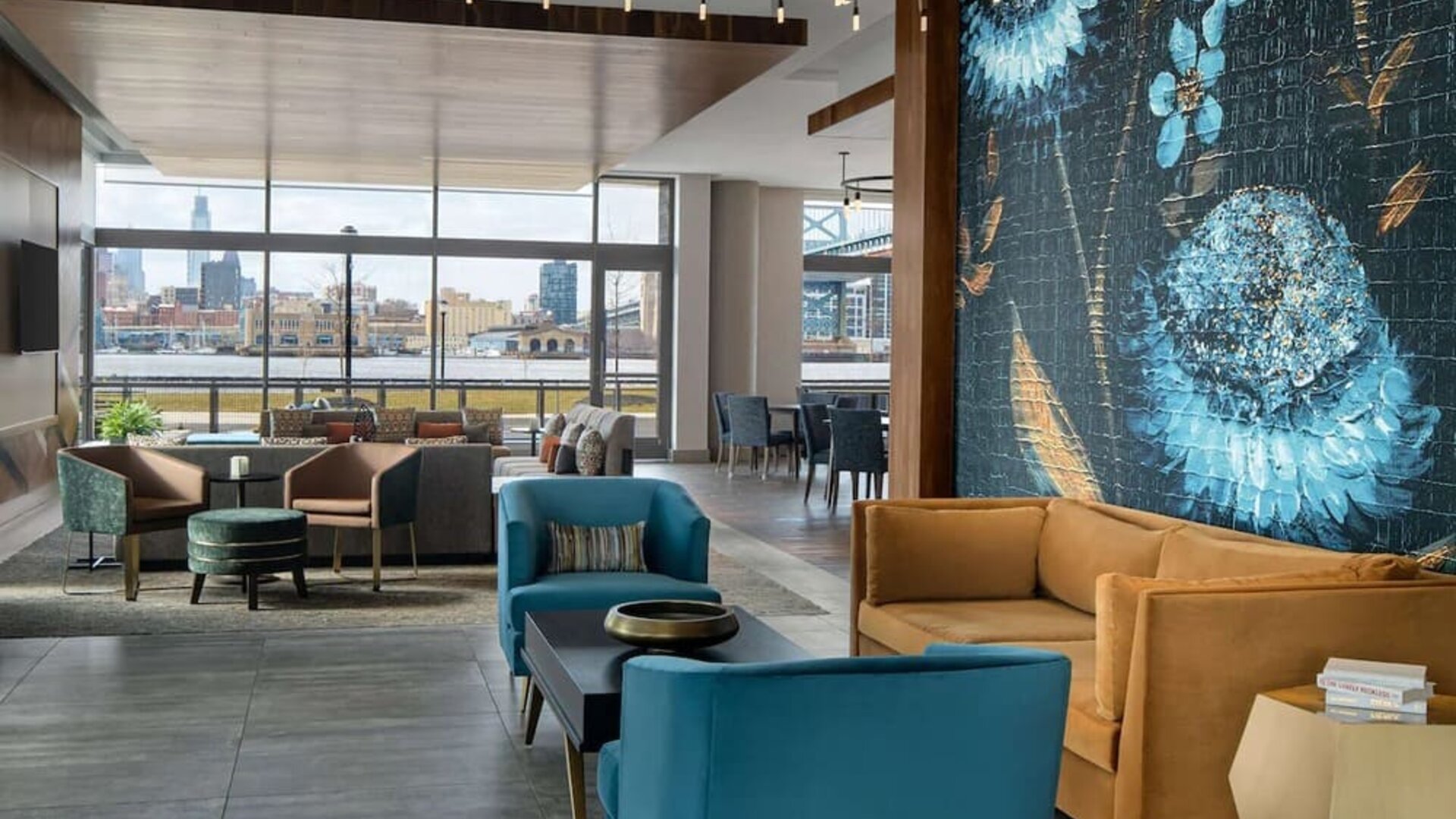 Lobby and coworking lounge at Hilton Garden Inn Camden Waterfront Philadelphia.