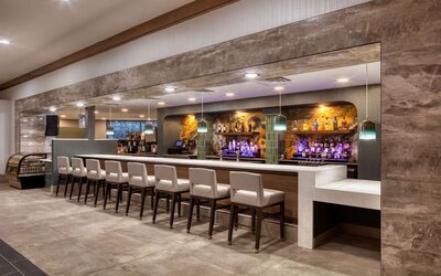 Hotel bar at DoubleTree By Hilton Tulsa - Warren Place.