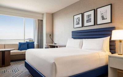 King bed at Hilton BNA Nashville Airport Terminal.
