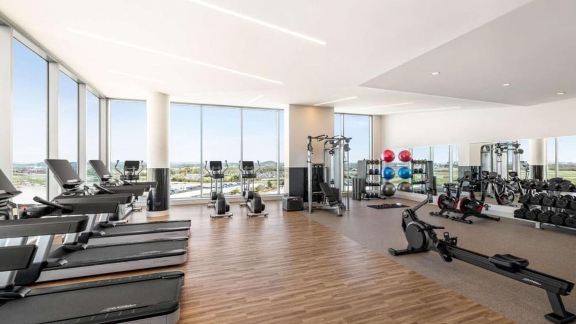 Fully equipped fitness center at Hilton BNA Nashville Airport Terminal.
