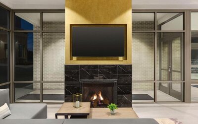 Lobby lounge with fireplace at Hilton Garden Inn Nashville West End Avenue.