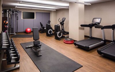 Fully equipped fitness center at Hilton Brooklyn New York.