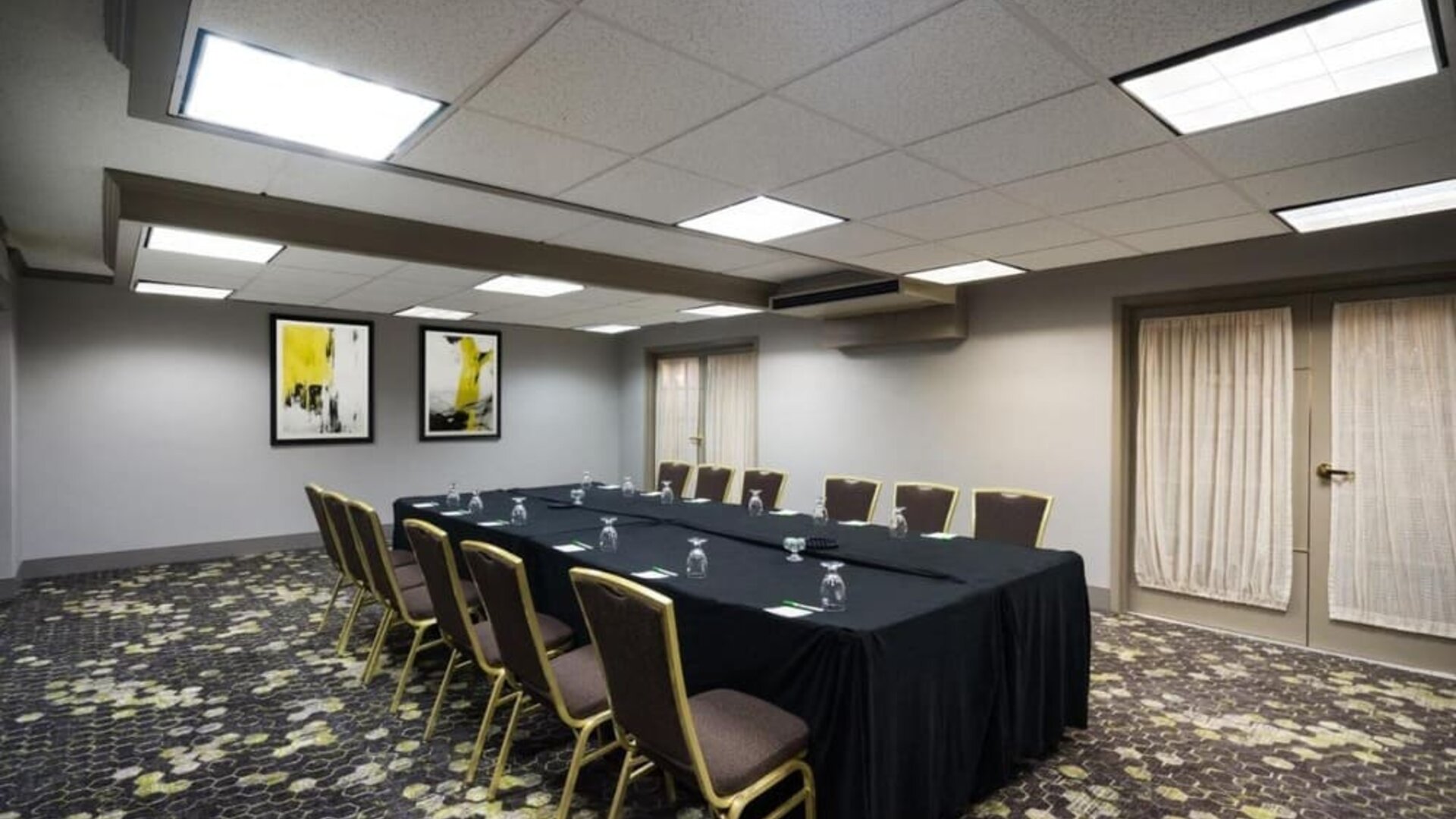 Professional meeting room at EnVision Hotel And Conference Center Mansfield Foxboro.