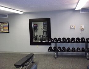 Fitness center at EnVision Hotel And Conference Center Mansfield Foxboro.