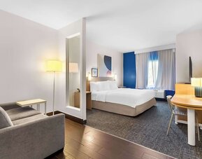 Bright and spacious day use room with lounge area at Spark By Hilton Pearland.