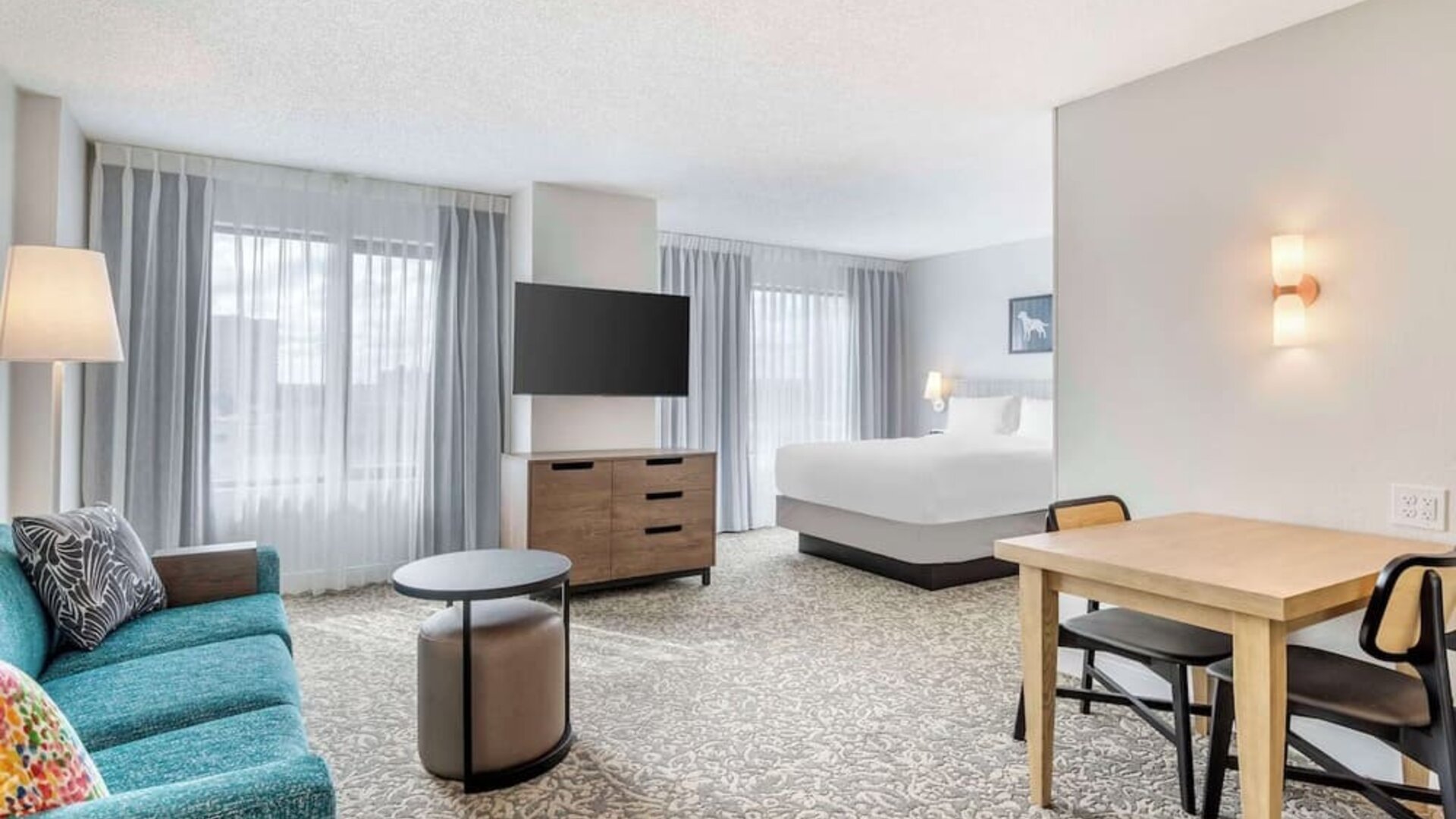 Day use room with workspace and lounge area at Sonesta ES Suites San Antonio Downtown Alamo Plaza.