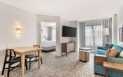 Day use suite with lounge area and workspace at Sonesta ES Suites San Antonio Downtown Alamo Plaza.